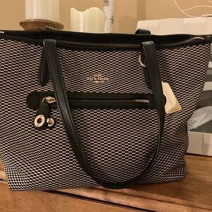 Coach bag size 14 inch by 9 inch